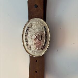 C Lazy U oval belt buckle by Montana Silversmiths and Justin leather belt.